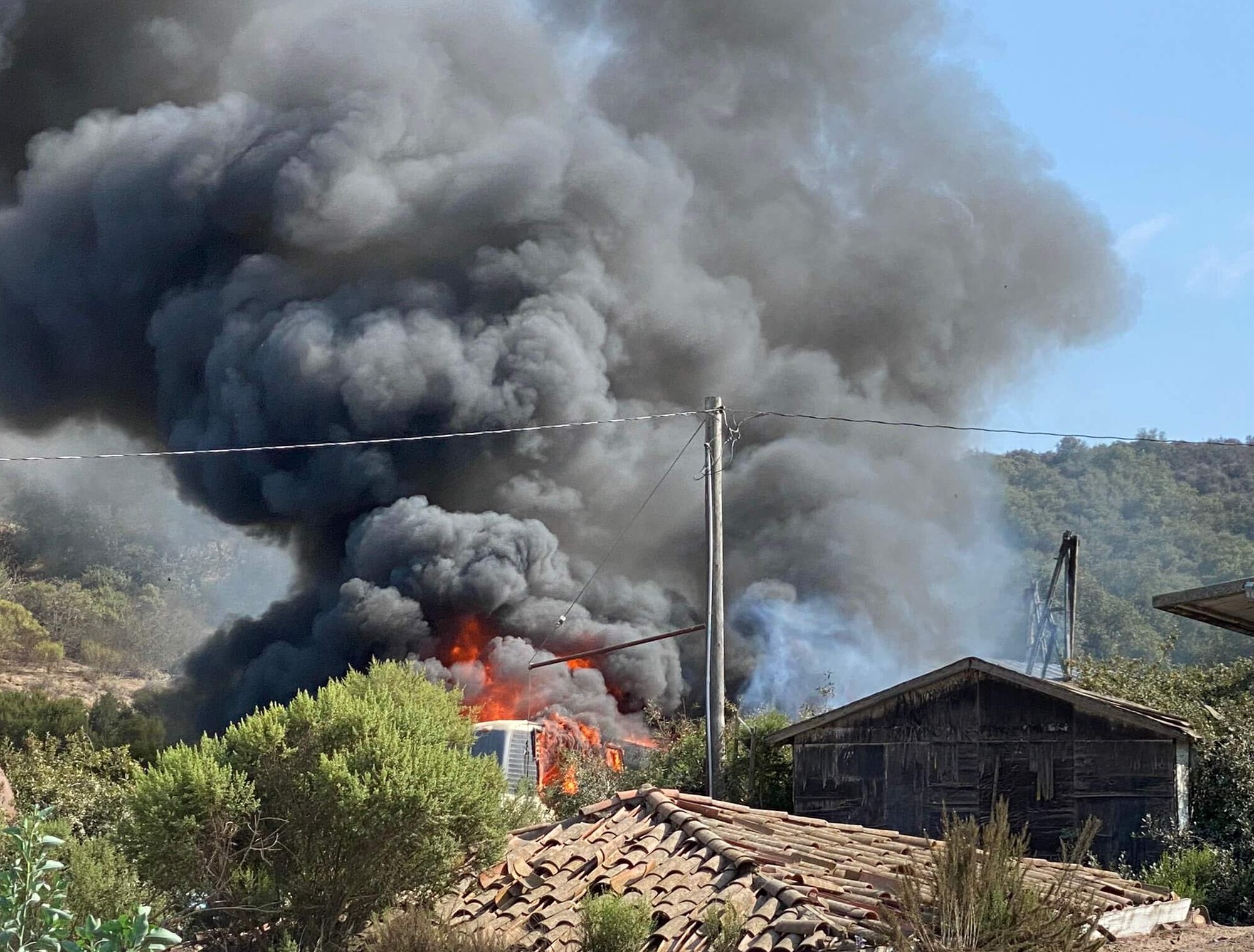 gray smoke next to house